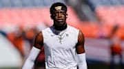Sep 17, 2023; Denver, Colorado, USA; Washington Commanders cornerback Emmanuel Forbes Jr. (13) before the game against the Denver Broncos at Empower Field at Mile High. Mandatory Credit: Isaiah J. Downing-Imagn Images