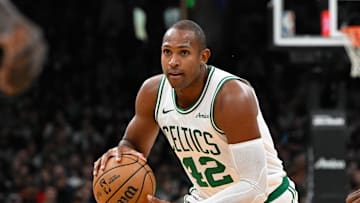 Nov 24, 2024; Boston, Massachusetts, USA; Boston Celtics center Al Horford (42) controls the ball against the Minnesota Timberwolves during the first half at TD Garden. Mandatory Credit: Eric Canha-Imagn Images
