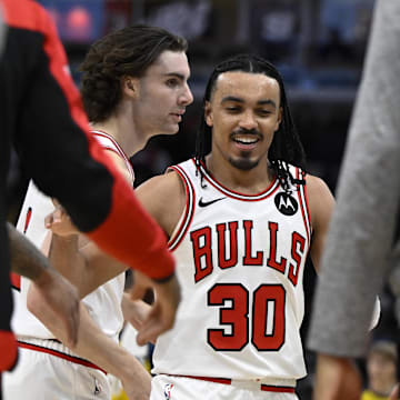 Mar 10, 2025; Chicago, Illinois, USA; Chicago Bulls guard Tre Jones (30) and guard Josh Giddey (3) during the second half against the Indiana Pacers  at United Center. Mandatory Credit: Matt Marton-Imagn Images