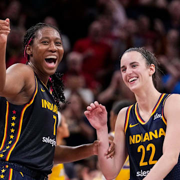 Indiana Fever forward Aliyah Boston (7) celebrates with Indiana Fever guard Caitlin Clark (22) altering recording a triple-double Wednesday, Sept. 4, 2024, during the game at Gainbridge Fieldhouse in Indianapolis. The Indiana Fever defeated the Los Angeles Sparks, 93-86.