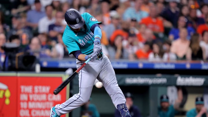 Seattle Mariners second baseman Jorge Polanco (7) hits a single against the Houston Astros during the fifth inning at Minute Maid Park on May 4.