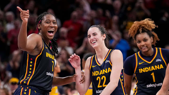 Indiana Fever forward Aliyah Boston (7) celebrates with Indiana Fever guard Caitlin Clark (22) altering recording a triple-double Wednesday, Sept. 4, 2024, during the game at Gainbridge Fieldhouse in Indianapolis. The Indiana Fever defeated the Los Angeles Sparks, 93-86.