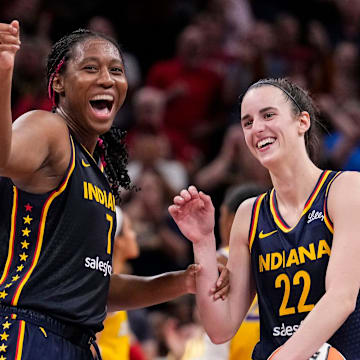 Indiana Fever forward Aliyah Boston (7) celebrates with Indiana Fever guard Caitlin Clark (22) altering recording a triple-double Wednesday, Sept. 4, 2024, during the game at Gainbridge Fieldhouse in Indianapolis. The Indiana Fever defeated the Los Angeles Sparks, 93-86.