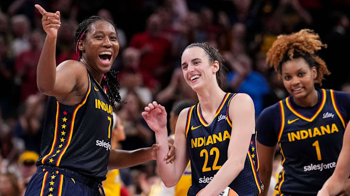 Indiana Fever forward Aliyah Boston (7) celebrates with Indiana Fever guard Caitlin Clark (22) altering recording a triple-double Wednesday, Sept. 4, 2024, during the game at Gainbridge Fieldhouse in Indianapolis. The Indiana Fever defeated the Los Angeles Sparks, 93-86.