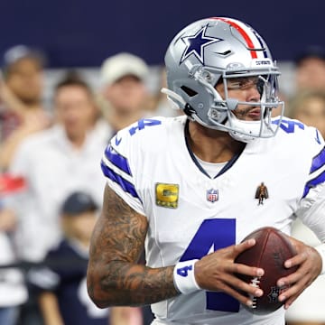 Dallas Cowboys quarterback Dak Prescott warms up before the game against the Arizona Cardinals at AT&T Stadium