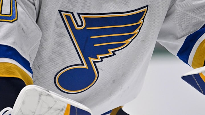 Dec 14, 2024; Dallas, Texas, USA; A view of the Blues logo on the jersey of St. Louis Blues goaltender Jordan Binnington (50) during the game between the Dallas Stars and the St. Louis Blues at American Airlines Center. Mandatory Credit: Jerome Miron-Imagn Images