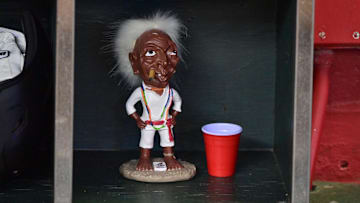 Sep 20, 2023; Phoenix, Arizona, USA;  A general view of a Jobu idol from the movie Major League sits among helmets in the Arizona Diamondbacks dugout prior to the game against the San Francisco Giants at Chase Field. Mandatory Credit: Matt Kartozian-Imagn Images