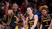 Indiana Fever forward Aliyah Boston (7) celebrates with Indiana Fever guard Caitlin Clark (22) altering recording a triple-double Wednesday, Sept. 4, 2024, during the game at Gainbridge Fieldhouse in Indianapolis. The Indiana Fever defeated the Los Angeles Sparks, 93-86.