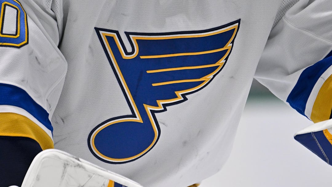 Dec 14, 2024; Dallas, Texas, USA; A view of the Blues logo on the jersey of St. Louis Blues goaltender Jordan Binnington (50) during the game between the Dallas Stars and the St. Louis Blues at American Airlines Center. Mandatory Credit: Jerome Miron-Imagn Images