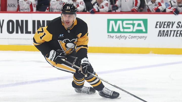 Apr 17, 2025; Pittsburgh, Pennsylvania, USA;  Pittsburgh Penguins center Evgeni Malkin (71) skates with the puck against the Washington Capitals during the second period at PPG Paints Arena. Mandatory Credit: Charles LeClaire-Imagn Images