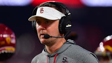 Dec 2, 2022; Las Vegas, NV, USA; Southern California Trojans head coach Lincoln Riley watches game action against the Utah Utes during the second half in the PAC-12 Football Championship at Allegiant Stadium. Mandatory Credit: Gary A. Vasquez-Imagn Images