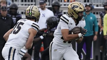 Purdue Boilermakers running back Devin Mockobee (45) runs the ball against the Northwestern Wildcats 