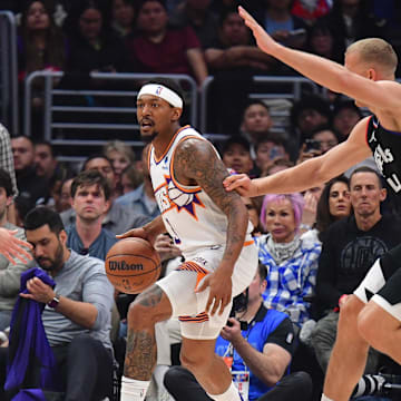 Apr 10, 2024; Los Angeles, California, USA; Phoenix Suns guard Bradley Beal (3) moves the ball against Los Angeles Clippers center Mason Plumlee (44) during the first half at Crypto.com Arena. Mandatory Credit: Gary A. Vasquez-Imagn Images