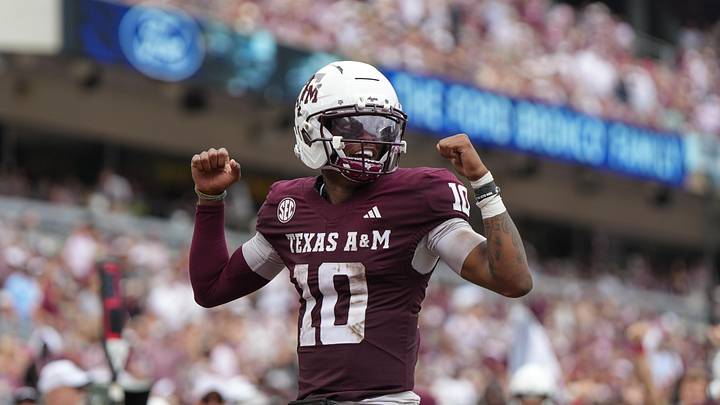 Sep 6, 2025; College Station, Texas, USA; Texas A&M Aggies quarterback Marcel Reed (10) celebrates after a touchdown pass during the second quarter against the Utah State Aggies at Kyle Field. Mandatory Credit: Sean Thomas-Imagn Images