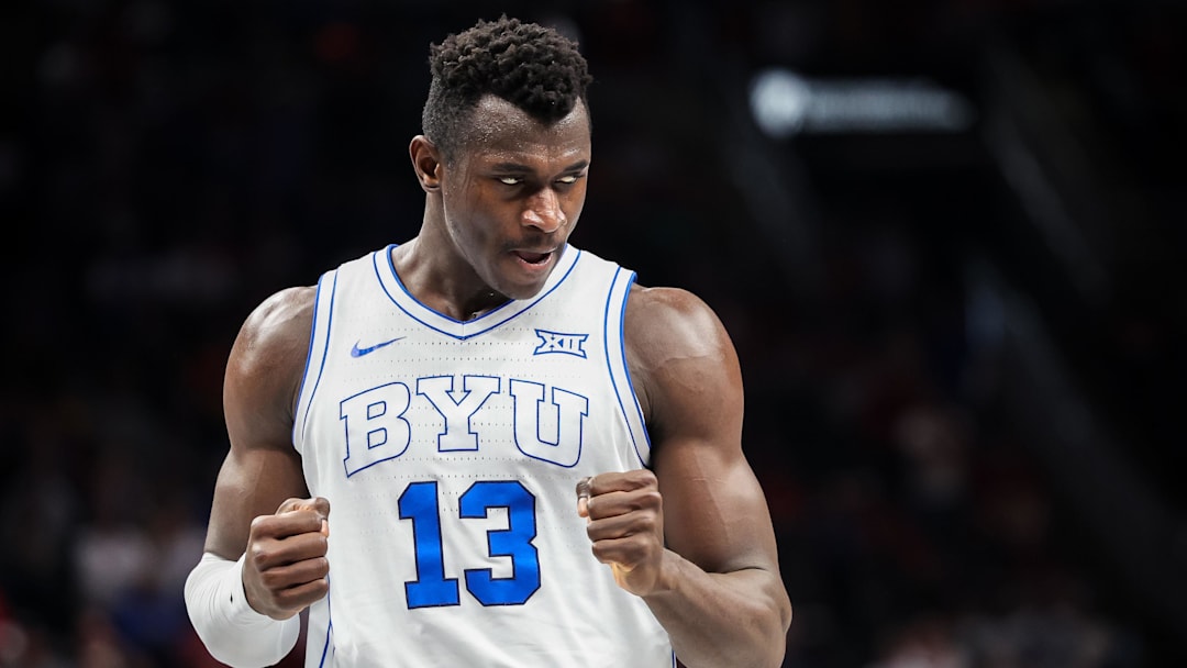 Mar 13, 2025; Kansas City, MO, USA; Brigham Young Cougars center Keba Keita (13) reacts after a play during the second half against the Iowa State Cyclones at T-Mobile Center. Mandatory Credit: William Purnell-Imagn Images
