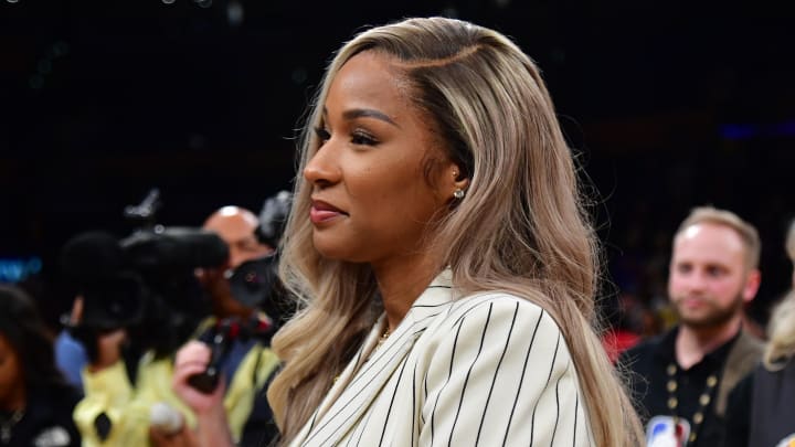 Feb 7, 2023; Los Angeles, California, USA; Savannah James watches her husband Los Angeles Lakers forward LeBron James (6) answer questions from media on court after the game against the Oklahoma City Thunder at Crypto.com Arena. 