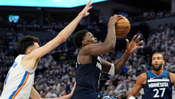 Minnesota Timberwolves guard Anthony Edwards shoots the ball past Oklahoma City Thunder forward Chet Holmgren in the second half during Game 4 of the Western Conference finals at Target Center in Minneapolis on May 26, 2025.