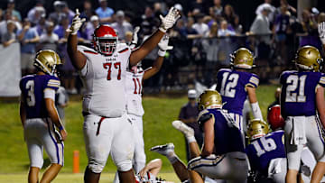 Brentwood Academy's Stephon Shivers (77) celebrates after quarterback George MacIntyre scored a touchdown against CPA during an high school football game Saturday, Aug. 24, 2024, in Nashville, Tenn.