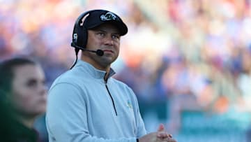 Dec 20, 2024; Tampa, FL, USA; Tulane Green Wave head coach Jon Sumrall looks on against the Florida Gators during the first quarter at Raymond James Stadium. Mandatory Credit: Kim Klement Neitzel-Imagn Images