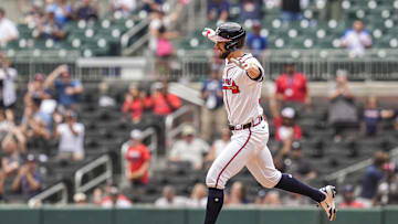 Sep 24, 2025; Cumberland, Georgia, USA; Atlanta Braves right fielder Eli White (36) runs and reacts after hitting a home run against the Washington Nationals during the ninth inning at Truist Park. Mandatory Credit: Dale Zanine-Imagn Images