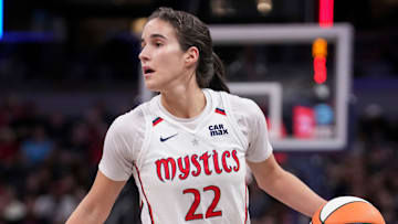 Washington Mystics guard Sonia Citron looks to pass the ball against the Indiana Fever.