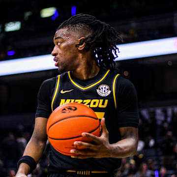 Missouri guard Sean East II looks to pass during a college basketball game against Ole Miss at Mizzou Arena on Mar. 2, 2024, in Columbia, Mo.