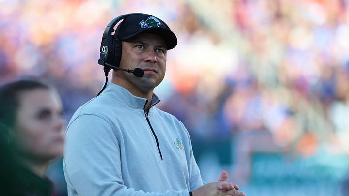 Dec 20, 2024; Tampa, FL, USA; Tulane Green Wave head coach Jon Sumrall looks on against the Florida Gators during the first quarter at Raymond James Stadium. Mandatory Credit: Kim Klement Neitzel-Imagn Images