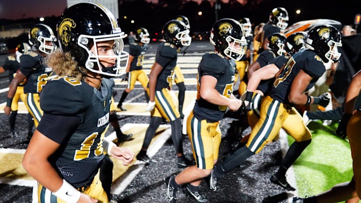 Julian Lewis (10), one of the nation's most heralded quarterbacks, and his Carrollton teammates will charge across the Alabama power to face A.H. Parker, Friday night.