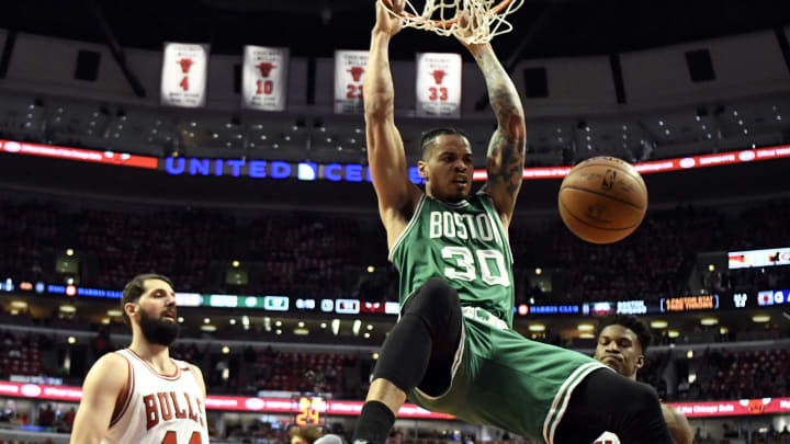 Apr 28, 2017; Chicago, IL, USA; Boston Celtics forward Gerald Green (30) dunks the ball as Chicago Bulls forward Nikola Mirotic (44) looks on during the first quarter in game six of the first round of the 2017 NBA Playoffs at United Center. Mandatory Credit: David Banks-USA TODAY Sports