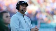 Dec 20, 2024; Tampa, FL, USA; Tulane Green Wave head coach Jon Sumrall looks on against the Florida Gators during the first quarter at Raymond James Stadium. 