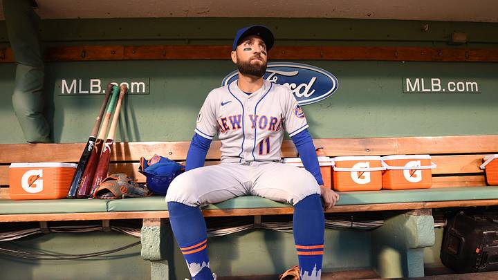 New York Mets left fielder Kevin Pillar (11) sits in the dugout.