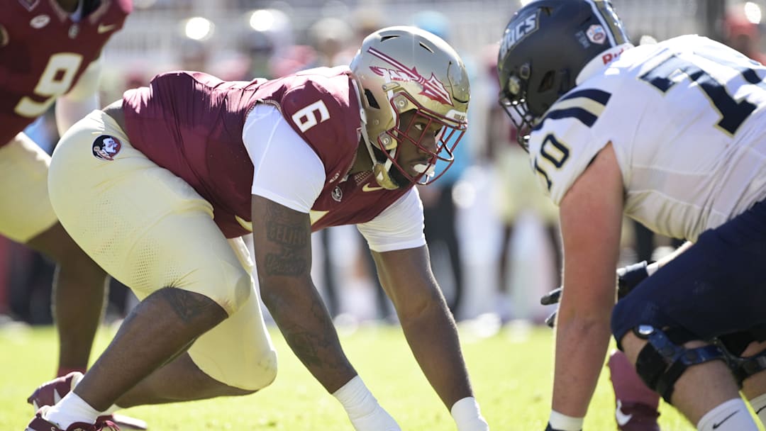 Nov 23, 2024; Tallahassee, Florida, USA; Florida State Seminoles defensive lineman Darrell Jackson Jr. (6) prepares for the snap during the first quarter against the Charleston Southern Buccaneers at Doak S. Campbell Stadium.