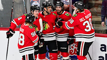 Feb 5, 2025; Chicago, Illinois, USA; Chicago Blackhawks defenseman Alec Martinez (25) celebrates his goal with teammates against the Edmonton Oilers during the third period at the United Center. Mandatory Credit: Daniel Bartel-Imagn Images