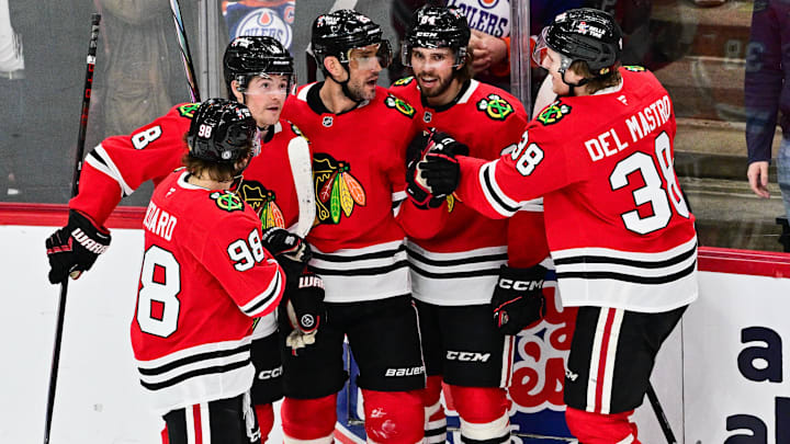 Feb 5, 2025; Chicago, Illinois, USA; Chicago Blackhawks defenseman Alec Martinez (25) celebrates his goal with teammates against the Edmonton Oilers during the third period at the United Center. Mandatory Credit: Daniel Bartel-Imagn Images