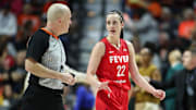 Sep 25, 2024; Uncasville, Connecticut, USA; Indiana Fever guard Caitlin Clark (22) talks to the referee during the first half against the Connecticut Sun during game two of the first round of the 2024 WNBA Playoffs at Mohegan Sun Arena. Mandatory Credit: Paul Rutherford-Imagn Images