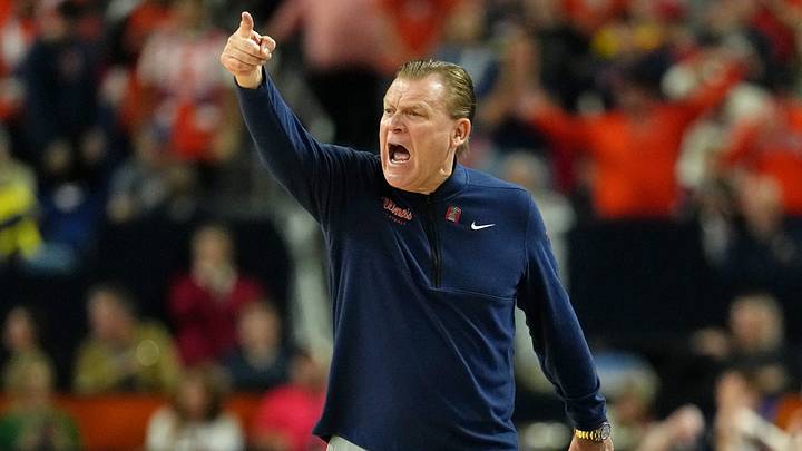 Apr 4, 2026; Indianapolis, IN, USA; Illinois Fighting Illini head coach Brad Underwood reacts after a play against the UConn Huskies during the first half of a semifinal of the Final Four of the men's 2026 NCAA Tournament at Lucas Oil Stadium. Mandatory Credit: Bob Donnan-Imagn Images