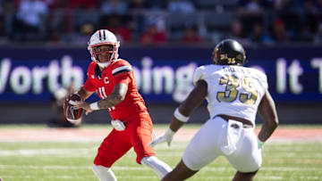 Oct 19, 2024; Tucson, Arizona, USA; Arizona Wildcats quarterback Noah Fifita (11) against the Colorado Buffalos in the first half at Arizona Stadium. Mandatory Credit: Mark J. Rebilas-Imagn Images
