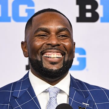 Jul 25, 2024; Indianapolis, IN, USA; Michigan Wolverines head coach Sherrone Moore speaks to the media during the Big 10 football media day at Lucas Oil Stadium. Mandatory Credit: Robert Goddin-Imagn Images