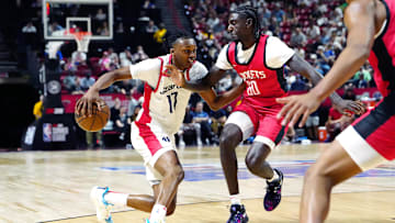 Jul 14, 2024; Las Vegas, NV, USA; Washington Wizards guard Bub Carrington (17) dribbles against Houston Rockets guard Kira Lewis Jr (60) during the first quarter at Thomas & Mack Center. Mandatory Credit: Stephen R. Sylvanie-Imagn Images