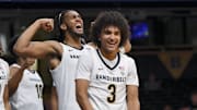 Nov 3, 2025; Nashville, Tennessee, USA;  Vanderbilt Commodores guard Tyler Tanner (3) and forward Devin McGlockton (99) celebrate a made basket plus the foul against the Lipscomb Bisons during the second half at Memorial Gymnasium. Mandatory Credit: Steve Roberts-Imagn Images