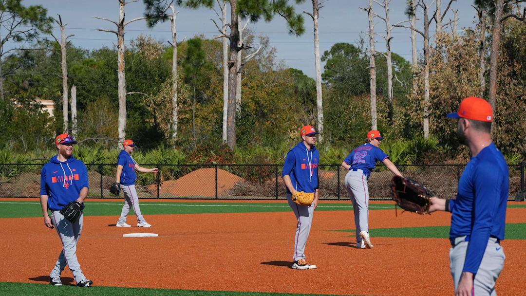 Feb 12, 2026; Port St. Lucie, FL, USA;  New York Mets pitchers warm-up during spring training. Mandatory Credit: Jim Rassol-Imagn Images