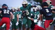 Basha running back Noah Roberts (15) runs against Liberty High in a scrimmage on Aug. 19, in Peoria, Arizona.