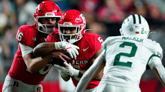 DUPLICATE***Rutgers Scarlet Knights quarterback Athan Kaliakmanis (16) makes it difficult for Ohio Bobcats safety DJ Walker (2) to know whether or not the ball will be handed over to DUPLICATE***Rutgers Scarlet Knights running back CJ Campbell Jr. (5), Thursday, August 28, 2025, in Piscataway.