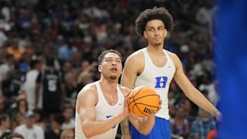 Apr 4, 2025; San Antonio, TX, USA; Duke basketball forward Mason Gillis (18) and guard Tyrese Proctor (5) during a practice session for the Final Four of the 2025 NCAA tournament at Alamodome.