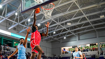 Columbus Explorers guard Jaxon Richardson (5) goes up for a lay up during the first quarter of the City of Palms Classic semifinal game against the IMG Academy Ascenders at Suncoast Credit Union Arena in Fort Myers, Fla., on Saturday, Dec. 21, 2024.