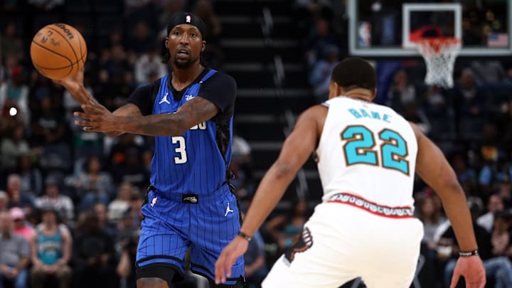 Oct 26, 2024; Memphis, Tennessee, USA; Orlando Magic guard Kentavious Caldwell-Pope (3) passes the ball as Memphis Grizzlies guard Desmond Bane (22) defends during the first half at FedExForum. Mandatory Credit: Petre Thomas-Imagn Images Oct 26, 2024; Memphis, Tennessee, USA; Orlando Magic guard Kentavious Caldwell-Pope (3) passes the ball as Memphis Grizzlies guard Desmond Bane (22) defends during the first half at FedExForum. Mandatory Credit: Petre Thomas-Imagn Images