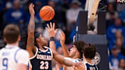 Gonzaga guard Adam Miller (23) and Kentucky center Malachi Moreno (24) go for a rebound during their game at Bridgestone Arena in Nashville Friday, Dec. 5, 2025.