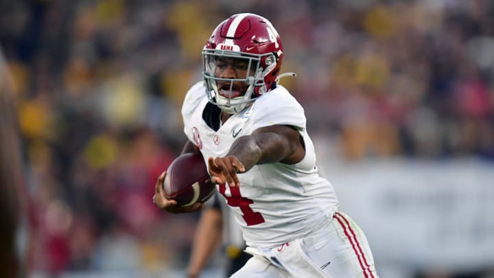 Jan 1, 2024; Pasadena, CA, USA; Alabama Crimson Tide quarterback Jalen Milroe (4) runs in the fourth quarter against the Michigan Wolverines  in the 2024 Rose Bowl college football playoff semifinal game at Rose Bowl. Mandatory Credit: Gary A. Vasquez-USA TODAY Sports