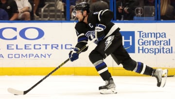 Apr 17, 2024; Tampa, Florida, USA; Tampa Bay Lightning center Steven Stamkos (91) skates with the puck against the Toronto Maple Leafs during the second period at Amalie Arena. Mandatory Credit: Kim Klement Neitzel-USA TODAY Sports