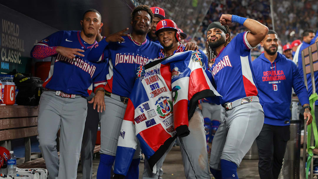 Mar 11, 2026; Miami, FL, United States; Dominican Republic second baseman Ketel Marte (4) celebrates with third baseman Manny MacHado (3), shortstop Geraldo Perdomo (2), and right fielder Fernando Tatis Jr. (23) after hitting a home run against Venezuela during the third inning at loanDepot Park. Mandatory Credit: Sam Navarro-Imagn Images Mar 11, 2026; Miami, FL, United States; Dominican Republic second baseman Ketel Marte (4) celebrates with third baseman Manny MacHado (3), shortstop Geraldo Perdomo (2), and right fielder Fernando Tatis Jr. (23) after hitting a home run against Venezuela during the third inning at loanDepot Park. Mandatory Credit: Sam Navarro-Imagn Images